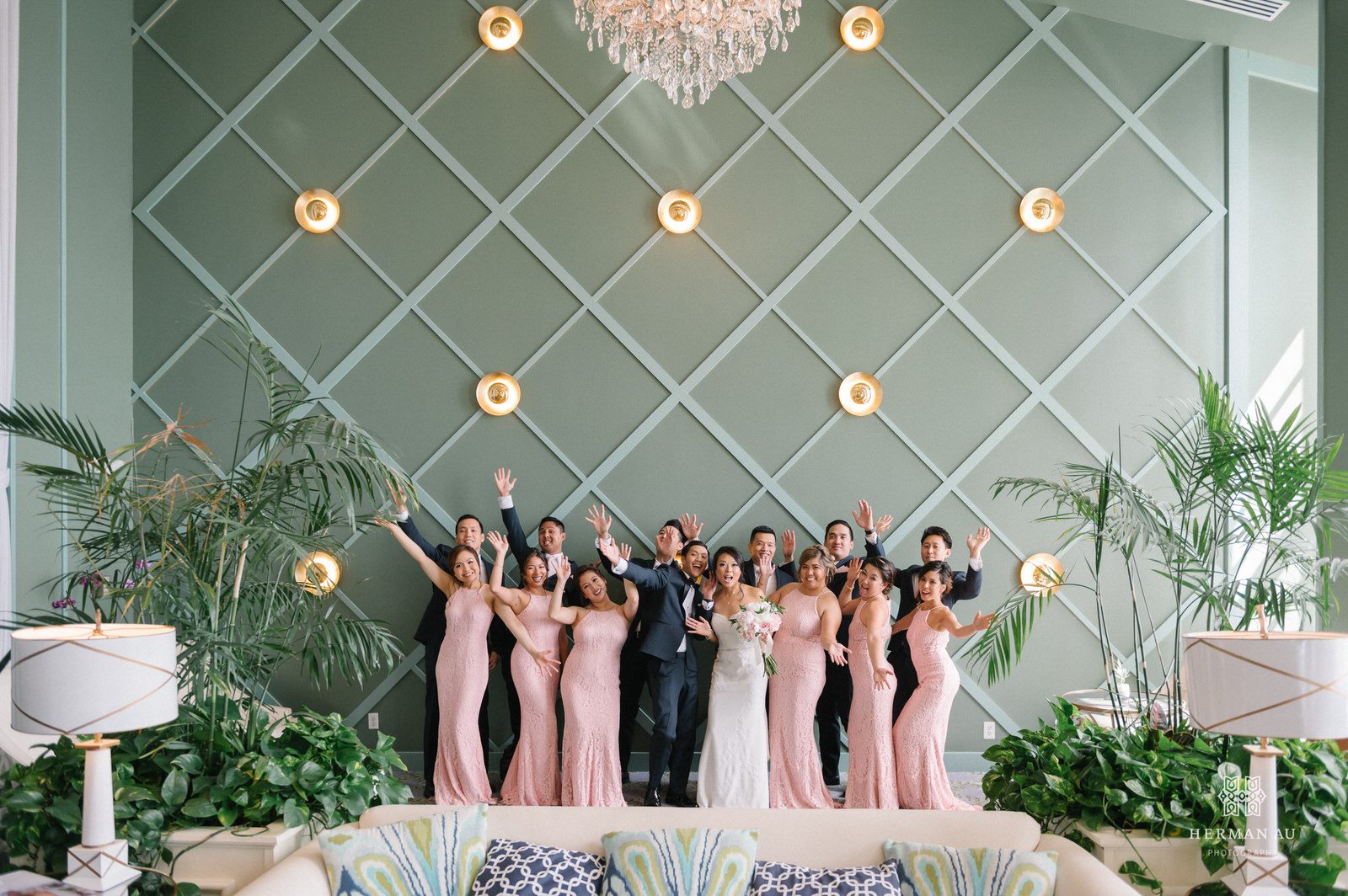 The entire bridal party striking a goofy pose