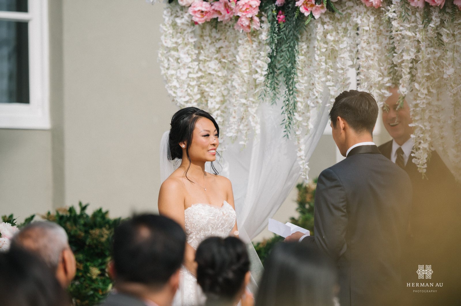 Bride staring into her groom's eyes during the ceremony